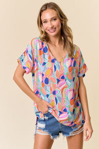 Floral pink, blue & orange top