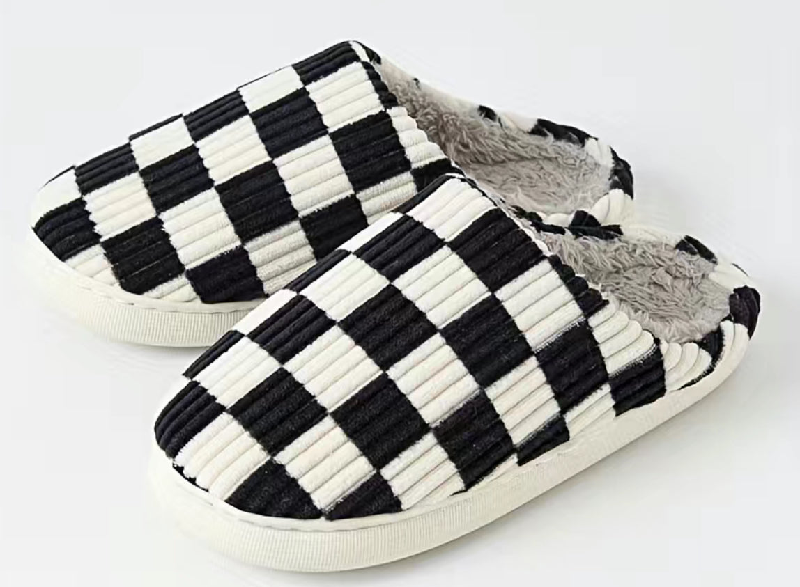 Comfy, cushy, Sherpa lined black and white checkered slippers
