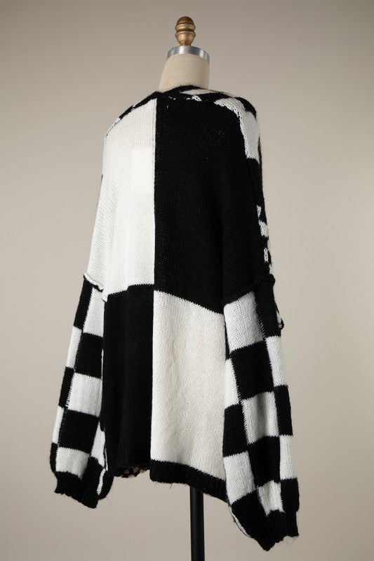 Black and white checkered cardigan sweater