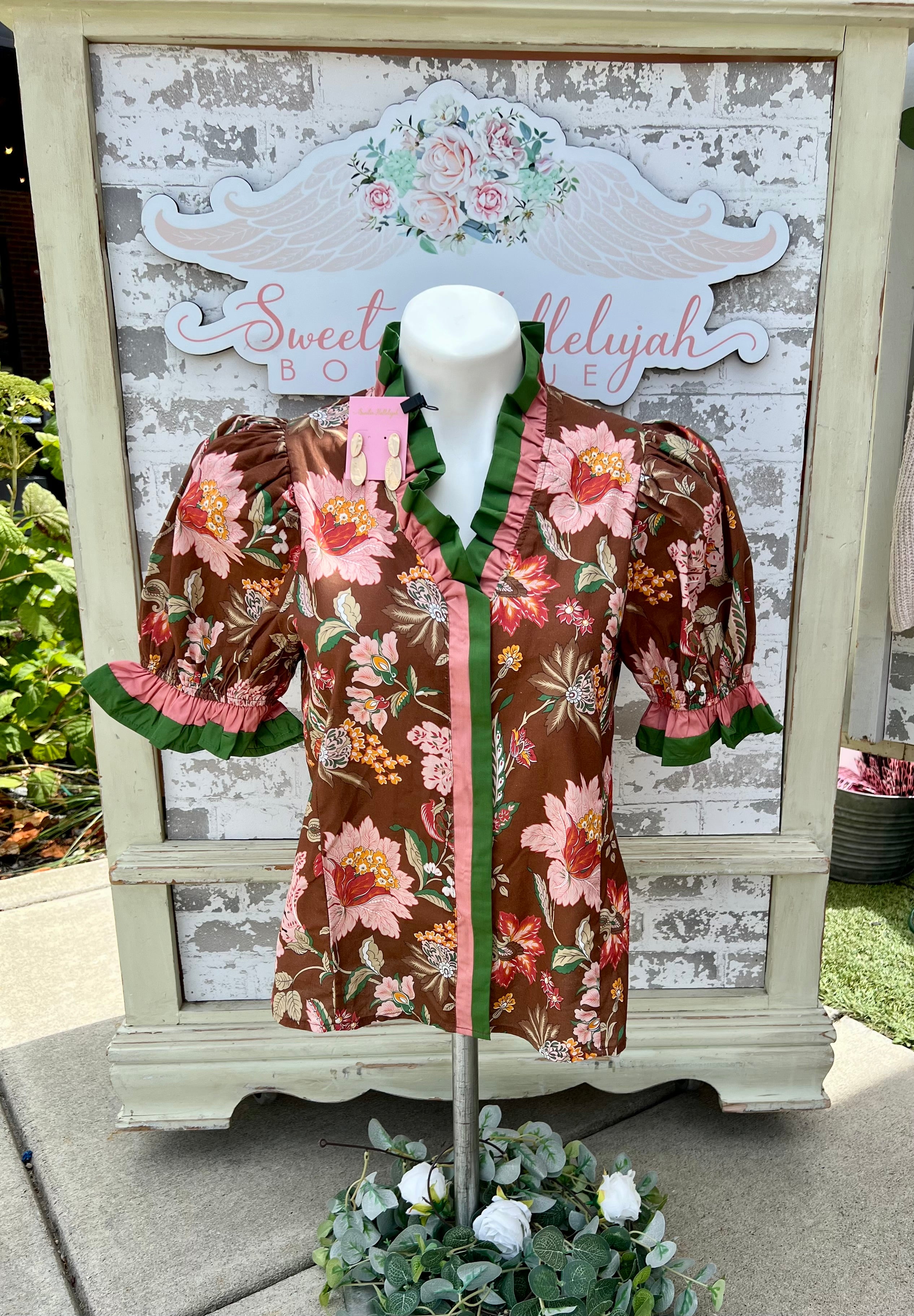 Entro brown floral top with ruffle green & mauve trim
