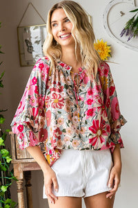 Floral print spring top with ruffle detail sleeve & cinched tie neckline