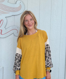 Bibi mustard waffle knit top with leopard puff sleeves
