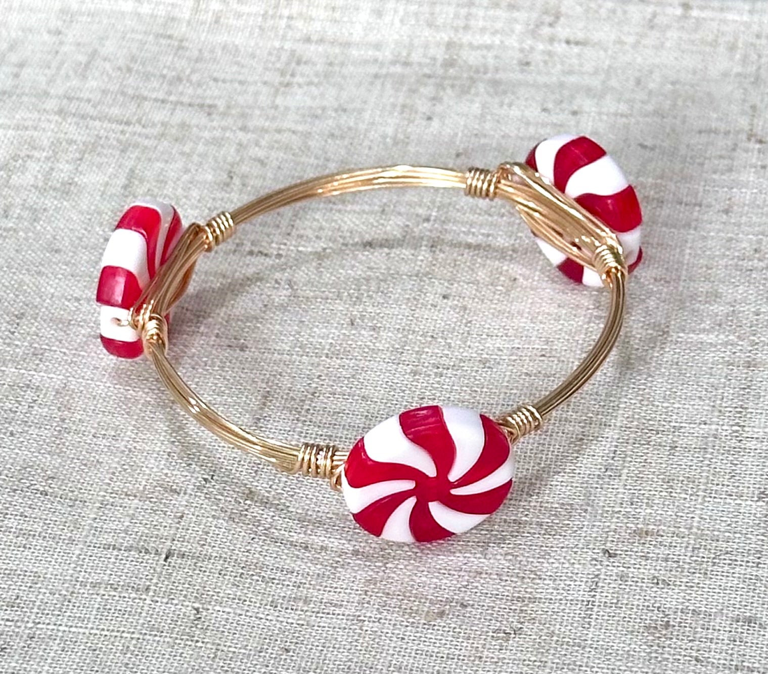 Handmade red Christmas peppermint gold stack layering bracelet