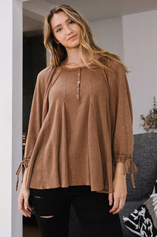 Oversized henley top with cinched sleeve cuffs, brown or green