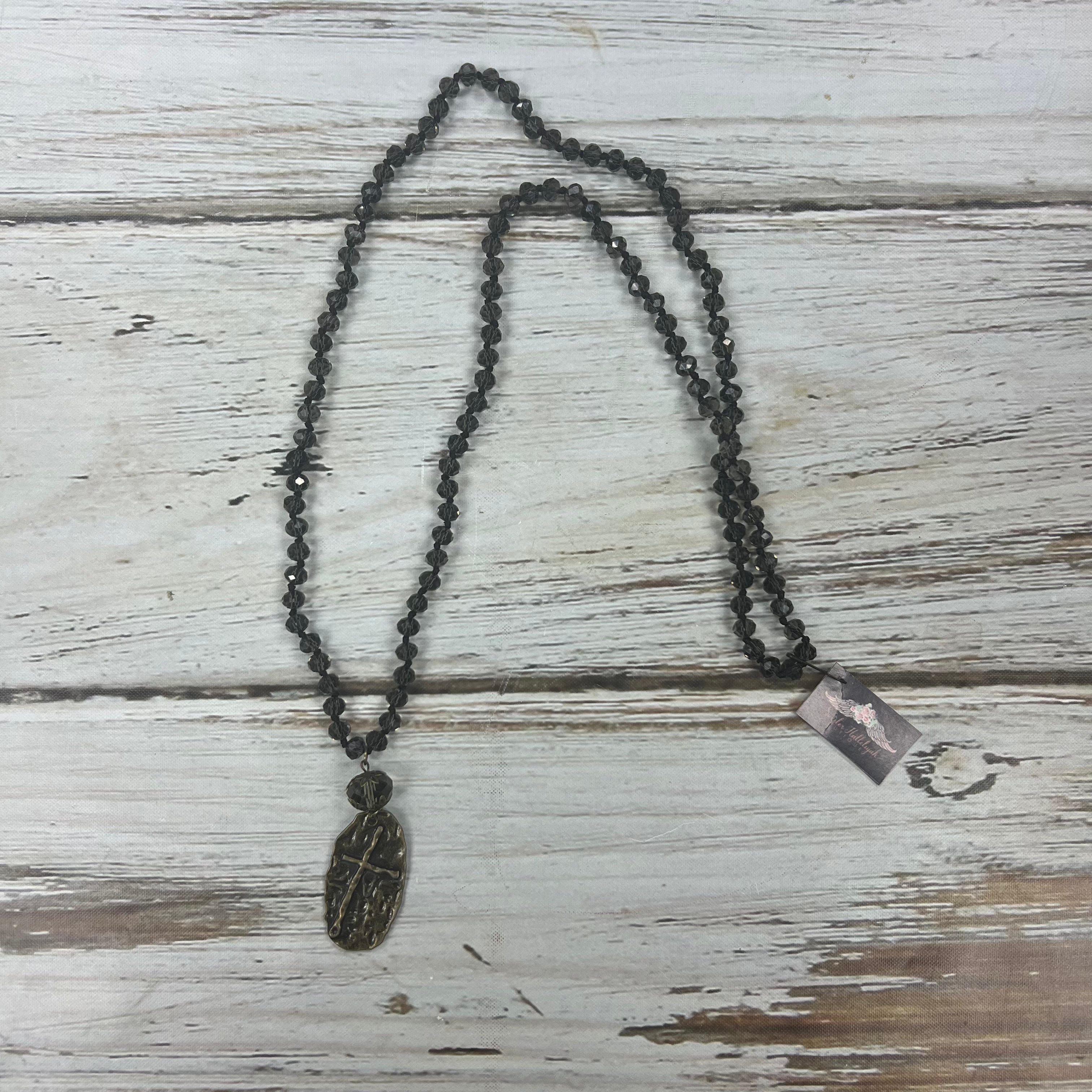 Handmade charcoal grey necklace with cross pendant