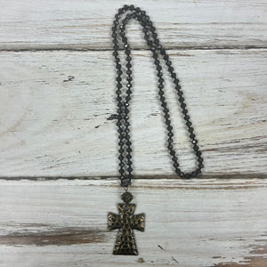 Handmade charcoal grey necklace with hammered cross pendant